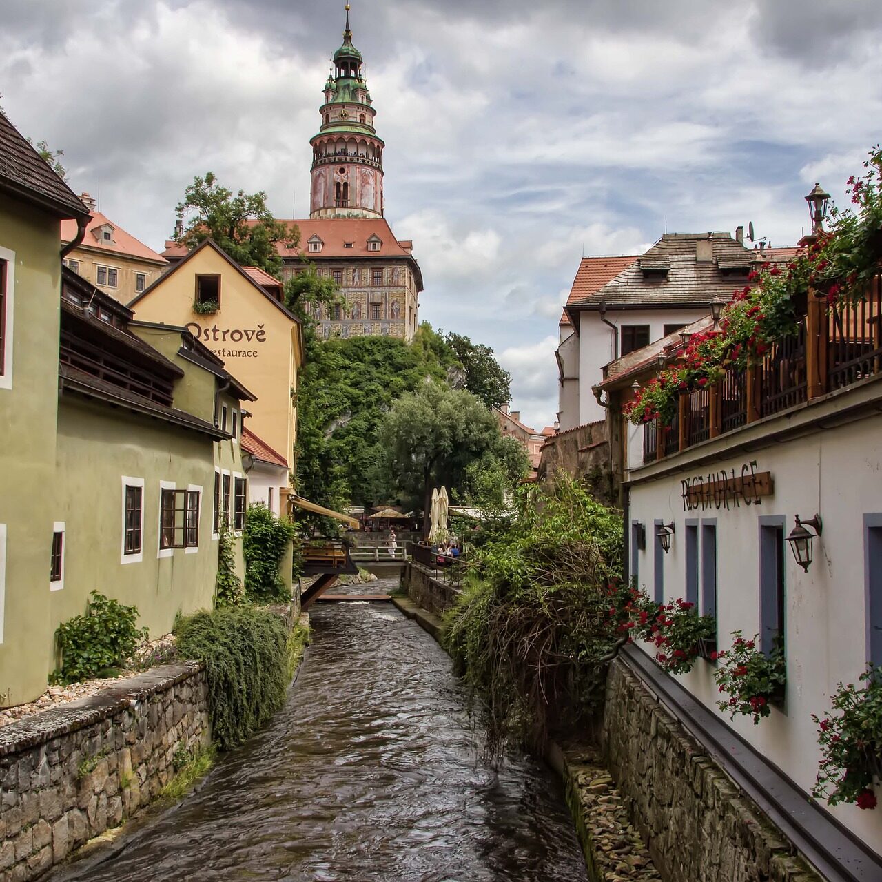 a canal running through Český Krumlov, south Bohemia, lined with beautiful traditional houses.