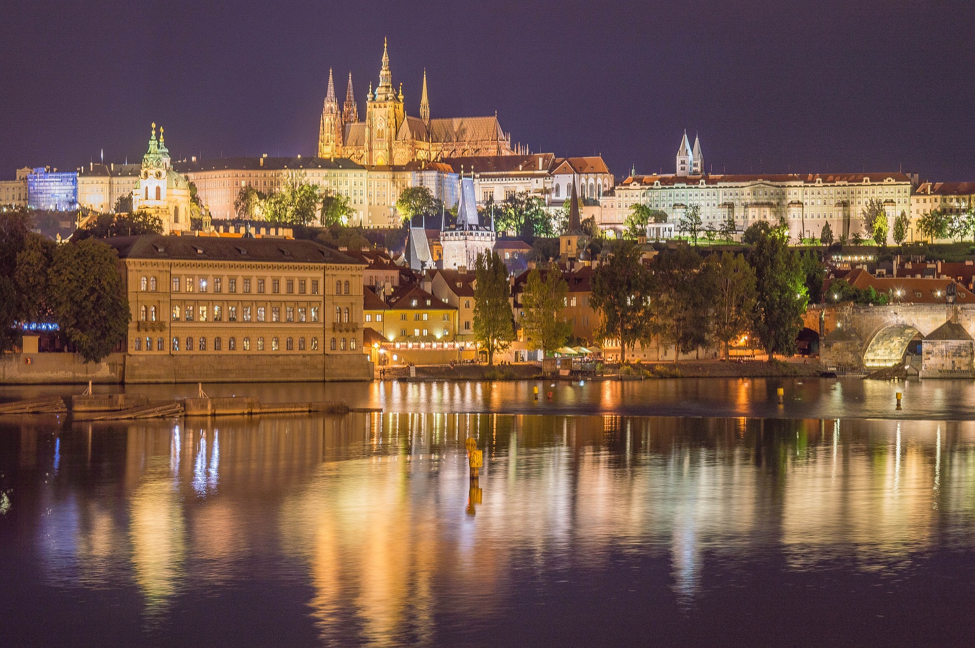 View of Prague Castle at night from the river