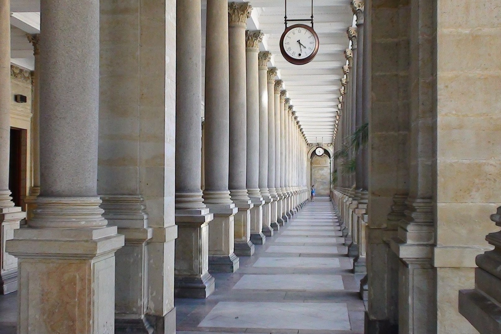 A stone colonnade in Karlovy Vary with hot mineral water.