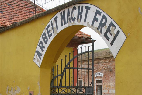 work-sets-you-free-terezin-concentration-camp "Work will set you free" reads the painted sign about Terezín Fortress in northern Czech Republic.
