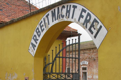 "Work will set you free" reads the painted sign about Terezín Fortress in northern Czech Republic.