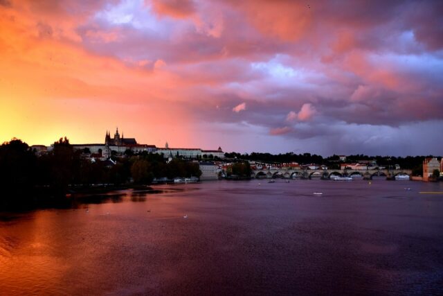 Sunset over Prague Castle and Charles Bridge